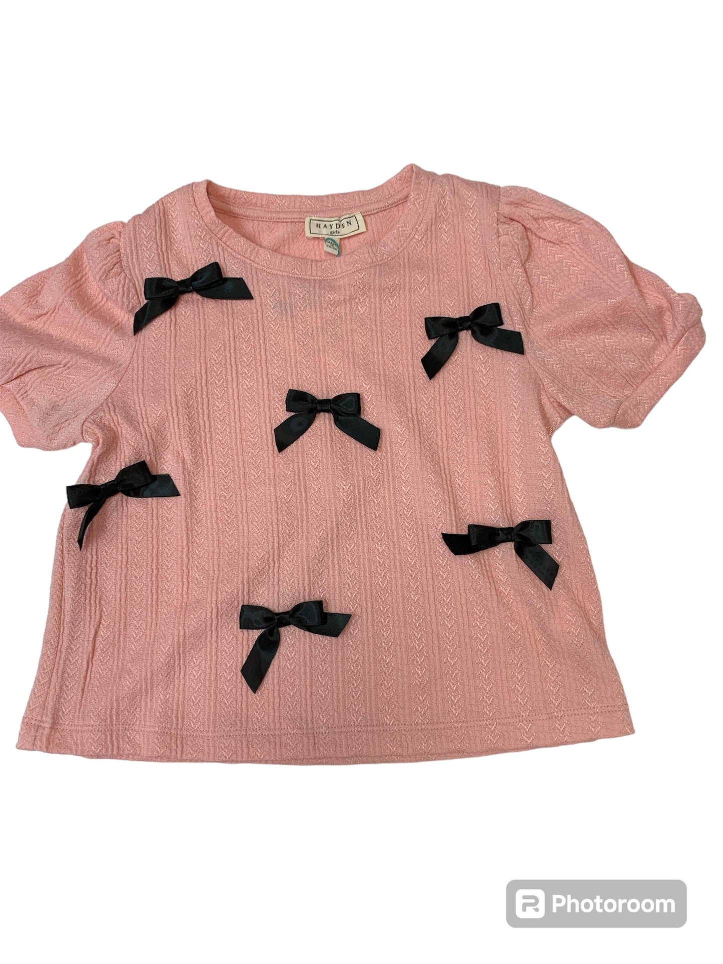 pink top w/ black bows